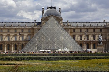 Guided Eiffel Tower, Louvre Museum and River Cruise tour